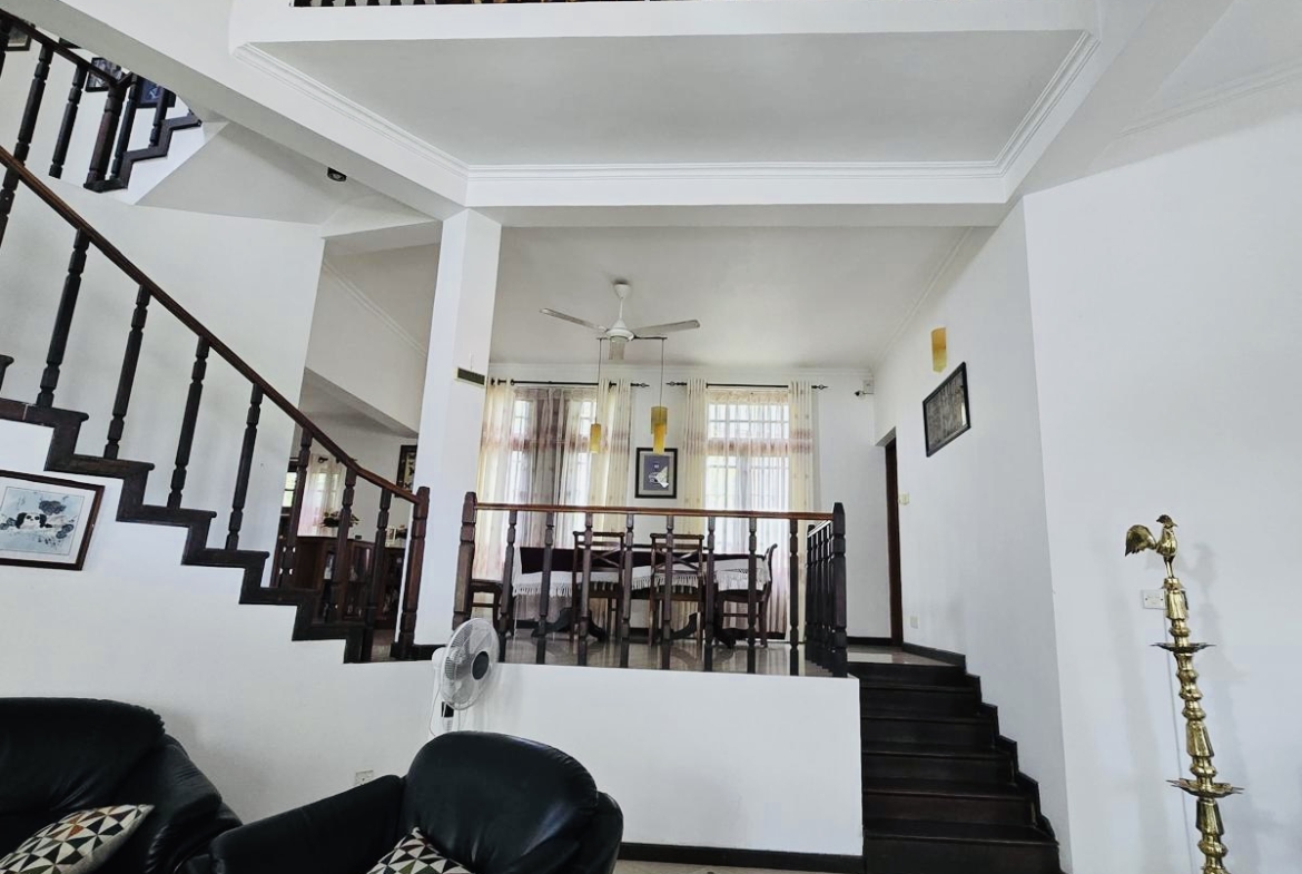 With four air-conditioned bedrooms, three bathrooms, and generous living spaces, this fully furnished two-storey house is designed for easy, relaxed living.